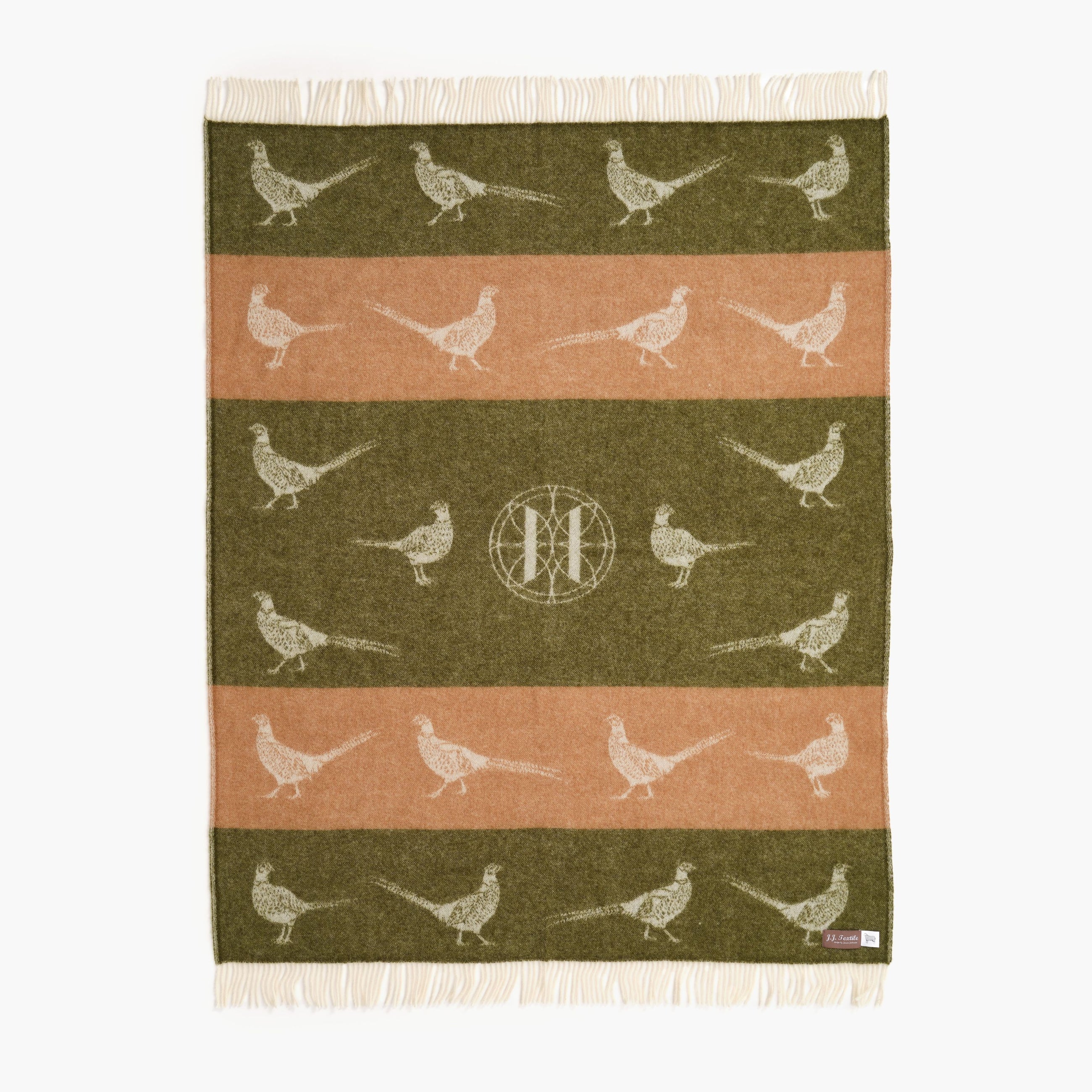 Woven throw with pheasant pattern on a white background