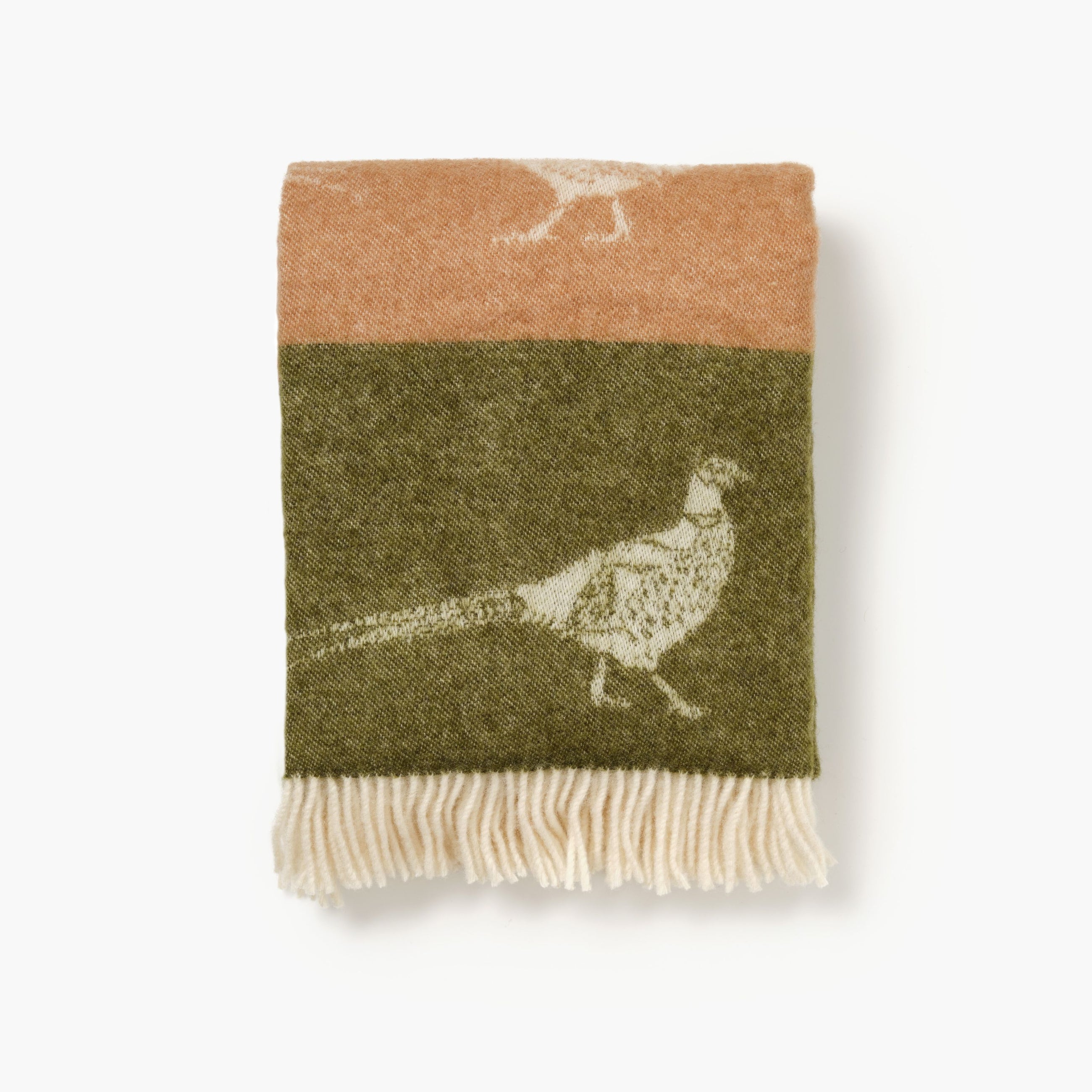 Woven blanket with pheasant design on a white background