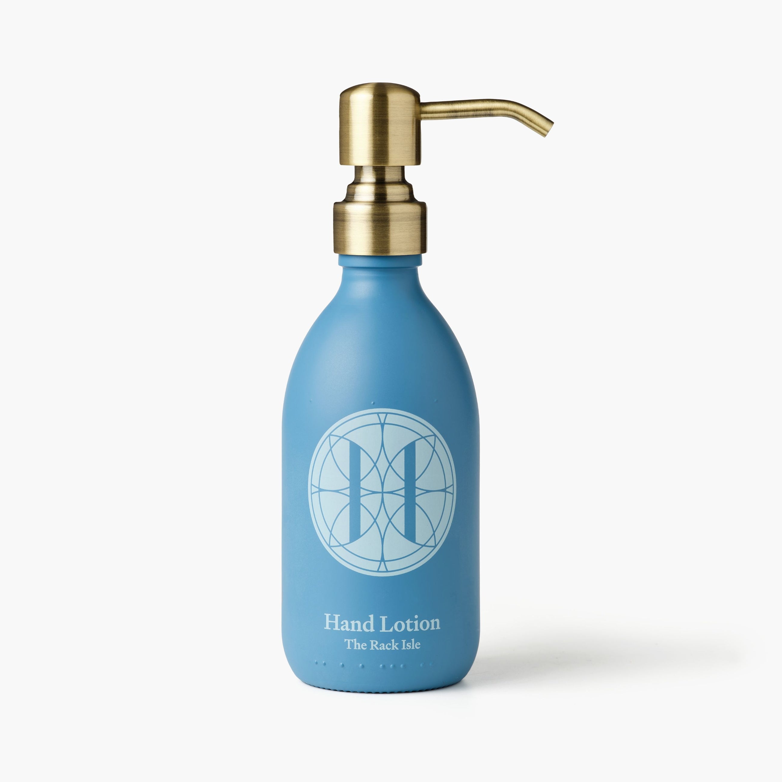 Eleven Bibury 'Rack Isle' blue bottle with gold pump on a white background