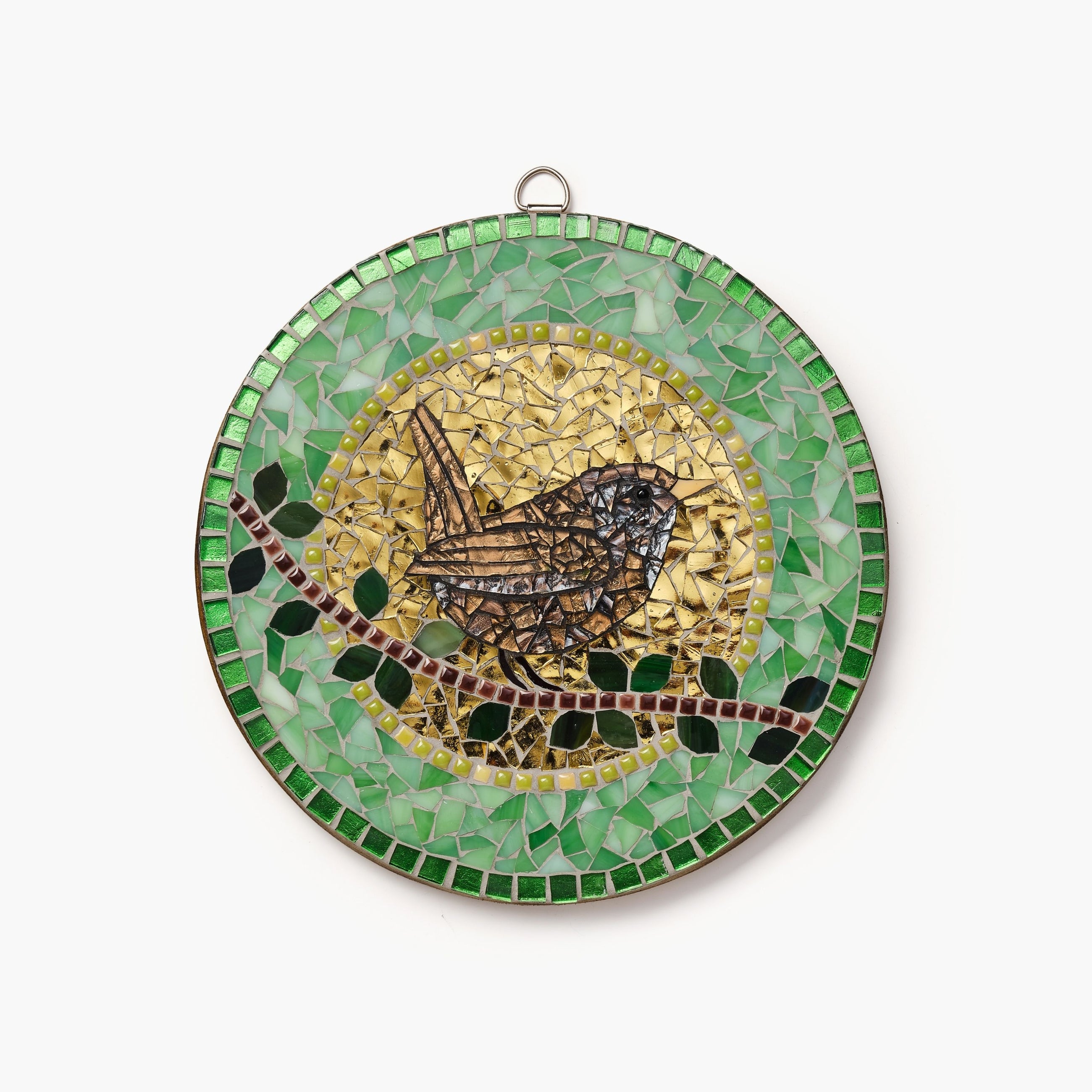 Round mosaic art piece with a bird design on a white background