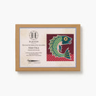 Cross stitch kit packaging with fish design on a white background