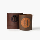 Eleven Bibury 'Gabriel's Muse' brown candle and packaging with 'Gabriel's Muse' branding on a white background