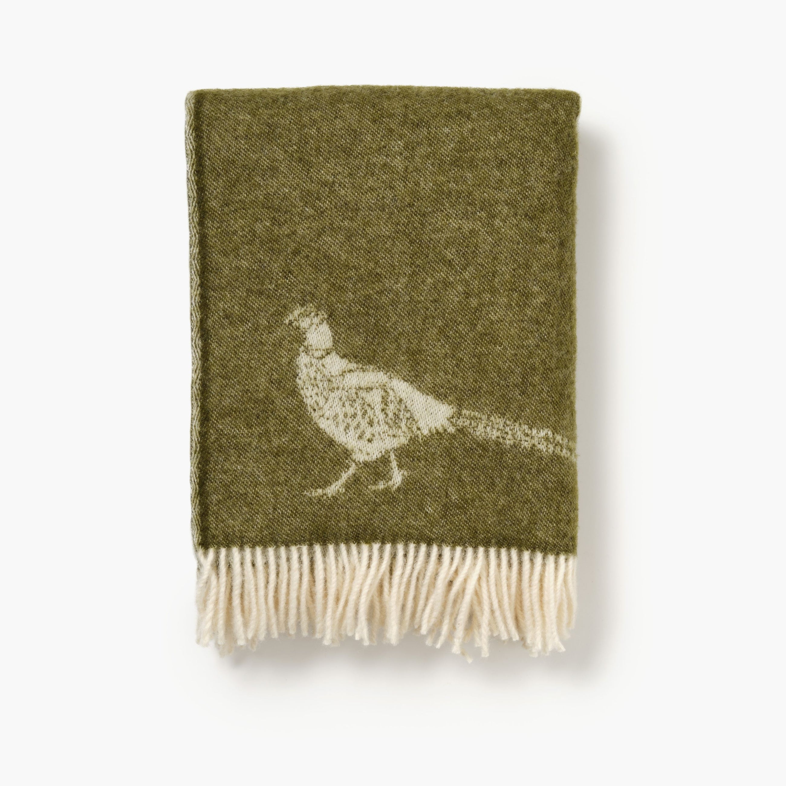 Green blanket with a pheasant design on a white background