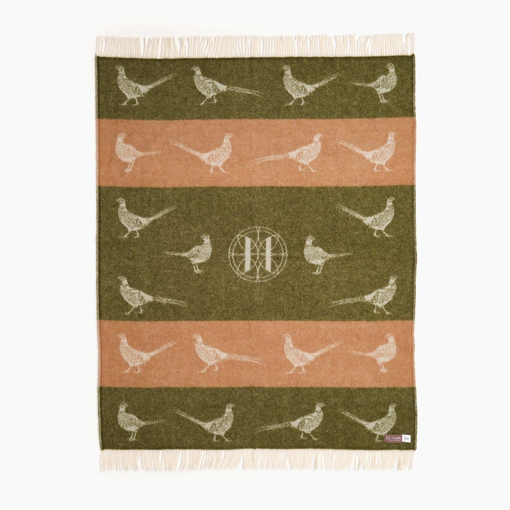 Woven throw with pheasant pattern on a white background