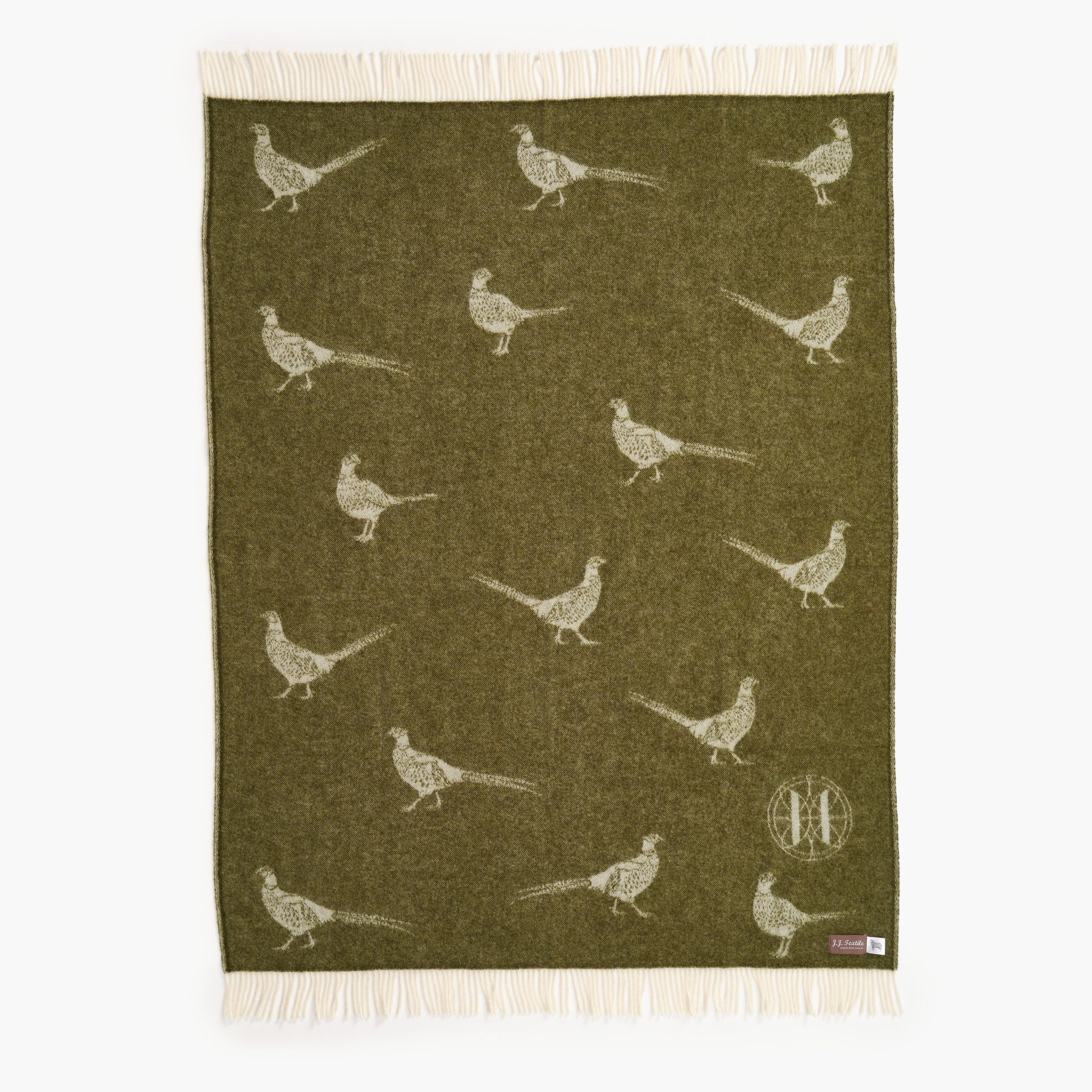 Green throw with pheasant pattern on a white background