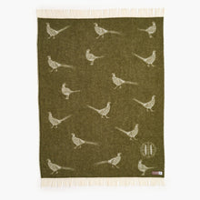 Green throw with pheasant pattern on a white background
