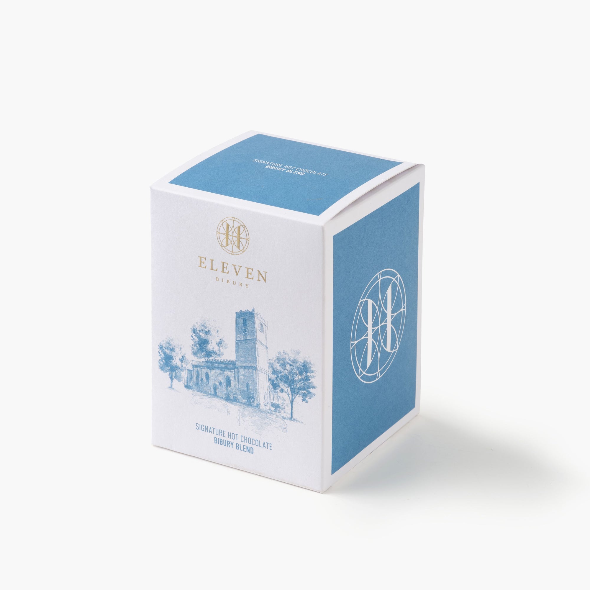 Hot Chocolate in white and blue box with 'ELEVEN BIBURY' branding on a white background