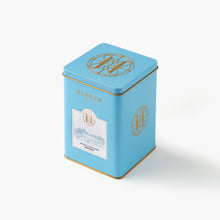 Blue coffee tin with gold accents and an Eleven Bibury label on a white background