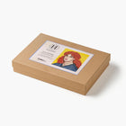 Brown box with a portrait of a woman on a white background