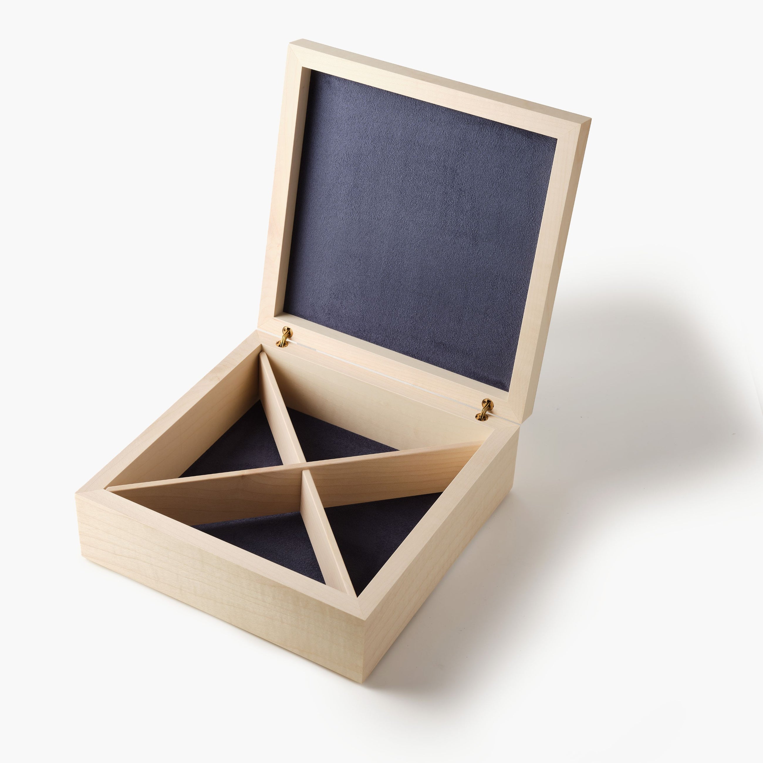 Wooden jewelry box with a dark interior on a white background