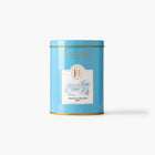 Blue tea canister with 'Eleven Bibury' branding on a white background