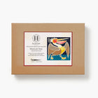Boxed cross stitch kit with pelican design on a white background