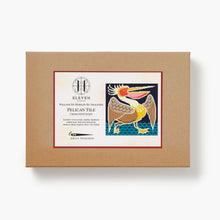 Boxed cross stitch kit with pelican design on a white background