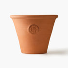Terracotta pot with a Eleven Bibury logo on a white background
