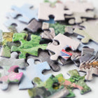 Assorted puzzle pieces with various designs on a white background