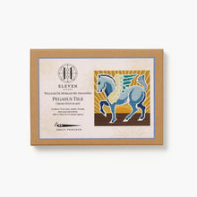 Cross stitch kit with Pegasus tile design on a white background
