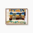 Set of embroidery threads in a decorative wooden box with a white background