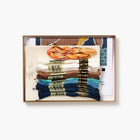 Set of colorful embroidery threads in a kraft box on a white background