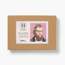Boxed needlepoint kit with a portrait of William Morris on a pink background