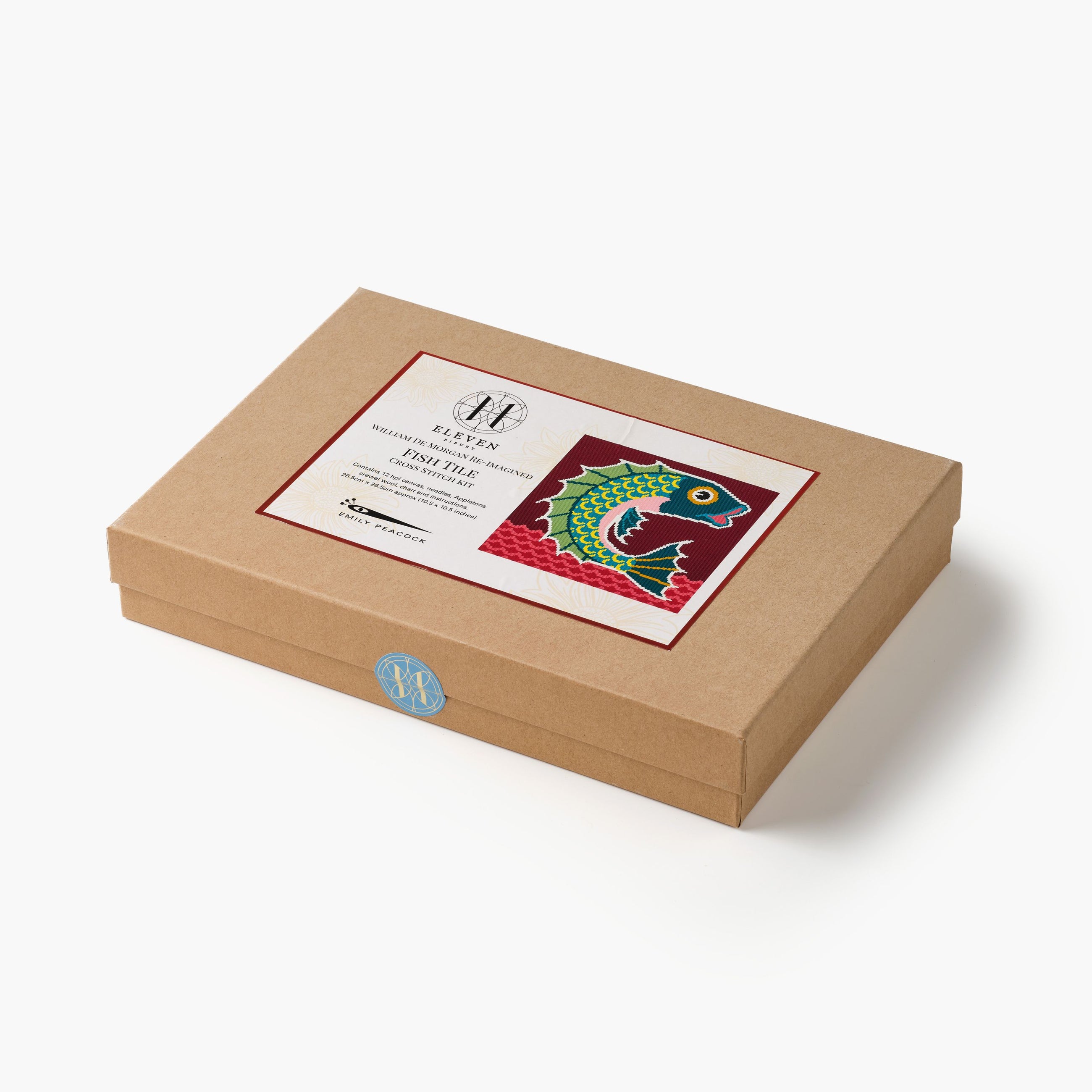 Brown cardboard box with a colorful fish design on a white background